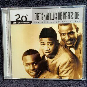 VINTAGE CURTIS MAYFIELD & THE IMPRESSIONS COMPACT DISC WITH 11 MUSIC SELECTIONS
